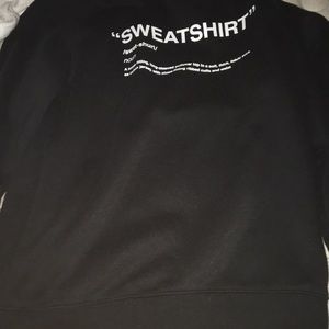 Male medium black sweatshirt says “sweatshirt”